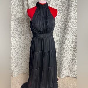 NWT Mac Duggal Black Halter Maxi with silver threading subtly through dress.